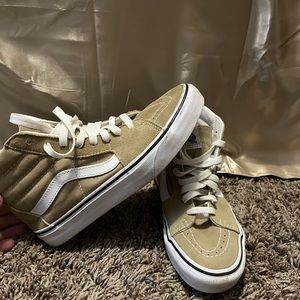 Tan high top vans